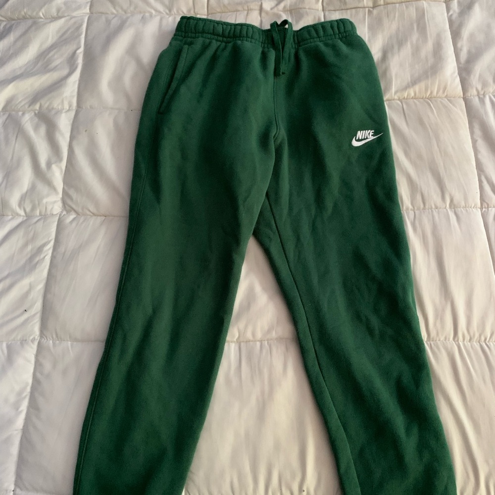 Dark green Nike sweats
